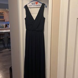 Navy blue bridesmaids gown worn once. In perfect condition. Size 6.